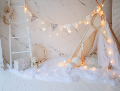 tent and decorative lamps in kids room